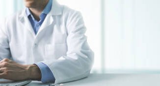 A Doctor working in his office