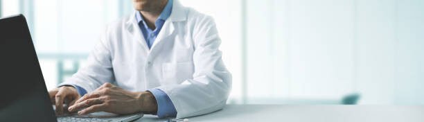 A Doctor working in his office