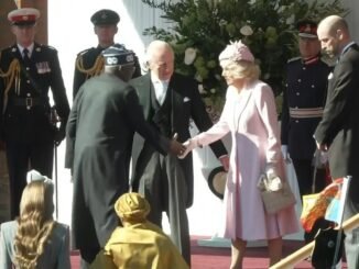 King Charles and Queen Camilla usher