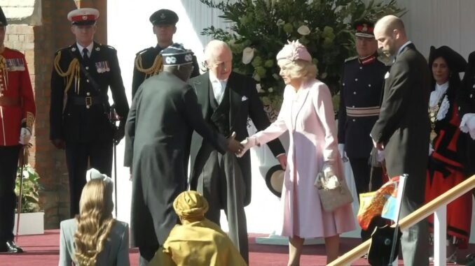 King Charles and Queen Camilla usher