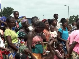 Child forced to carry stones overhead