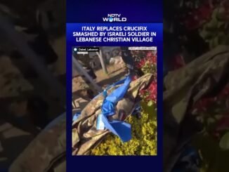 Italian troops restore vandalized statue