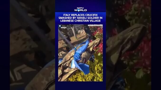 Italian troops restore vandalized statue