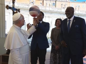 Pope Leo XIV spins ball with Globetrotters