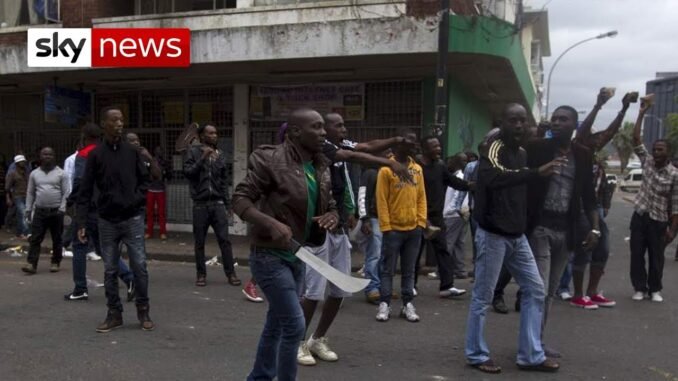 South Africans storm hospital, expel foreign patients