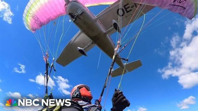 Paraglider hits plane mid-air