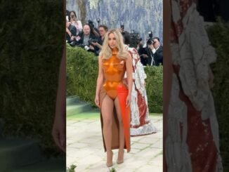 Kim Kardashian stuns Met Gala in orange breastplate leotard