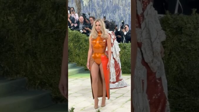 Kim Kardashian stuns Met Gala in orange breastplate leotard