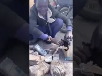 Bandits showing off ransom cash
