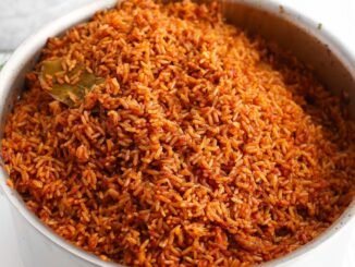 Man Scrubs Burnt Jollof Pot After Fine
