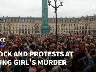 Paris women protest nude in street