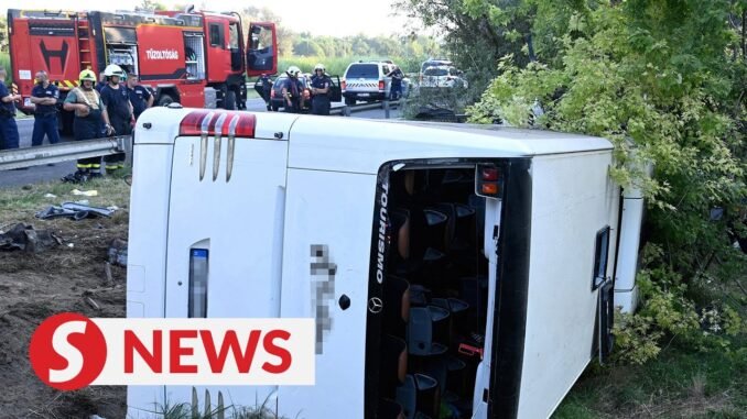 Bus Crash Kills Driver, Injures 23