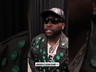 Davido honors abducted children names with jackect at FIFA event