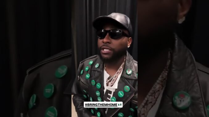 Davido honors abducted children names with jackect at FIFA event