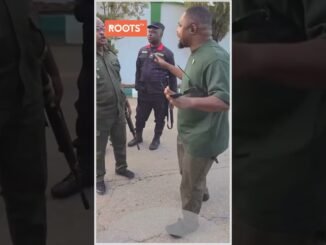 Suspect placed in car boot